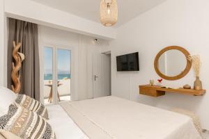 Televisyen dan/atau pusat hiburan di Ocean Whisper Apartment