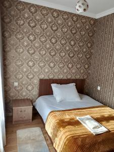 Postel nebo postele na pokoji v ubytování Guest House on V. Pshavela 50 + 27 fotografií