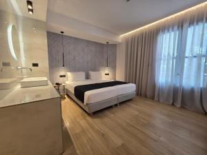 Voodi või voodid majutusasutuse Nireus Hotel toas