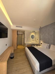 Voodi või voodid majutusasutuse Nireus Hotel toas