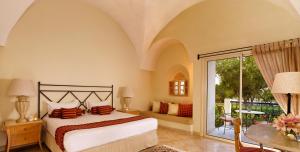 Кровать или кровати в номере The Residence Tunis