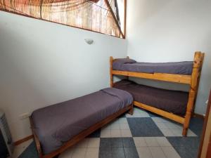 Posteľ alebo postele v izbe v ubytovaní Cabañas Buena Vista Rosi