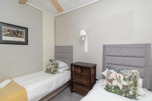 Ένα ή περισσότερα κρεβάτια σε δωμάτιο στο Beachcrest Suite @ Brookes Hill +52 φωτογραφίες