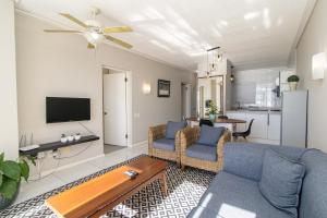 Μια τηλεόραση ή/και κέντρο ψυχαγωγίας στο Beachcrest Suite @ Brookes Hill