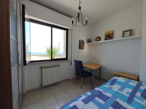 Ένα ή περισσότερα κρεβάτια σε δωμάτιο στο Casa Giulia