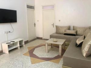 Posezení v ubytování KARAZ Homestay Grand appartement avec rooftop