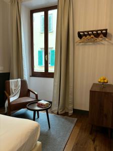 A bed or beds in a room at Affittacamere Zanobi 45