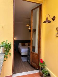 A bed or beds in a room at Affittacamere Zanobi 45