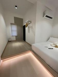 Postel nebo postele na pokoji v ubytování SWM Hotel