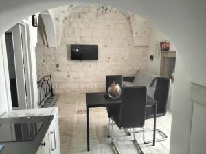 TV a/nebo společenská místnost v ubytování Le TRE ALCOVE