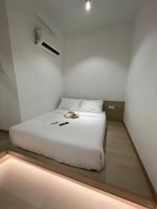Postel nebo postele na pokoji v ubytování SWM Hotel
