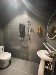 Koupelna v ubytování SWM Hotel