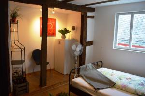 Ένα ή περισσότερα κρεβάτια σε δωμάτιο στο Ferienhaus Old Winery