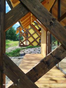 a view from the inside of a wooden building at Glamping Kr'Bee in Mala Nedelja