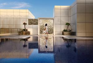 La pileta dentro o cerca de Millennium Place Doha