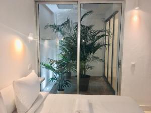 Posteľ alebo postele v izbe v ubytovaní Deluxe La Palma