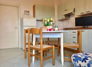 Kuchyň nebo kuchyňský kout v ubytování Seaside flat in Rosolina Mare - Beahost + 20 fotografií