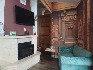 TV a/nebo společenská místnost v ubytování Gr Luxury