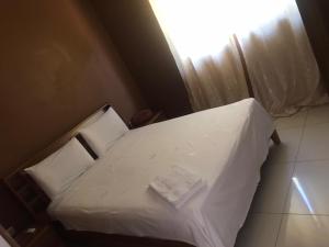 Postel nebo postele na pokoji v ubytování ABC guest house