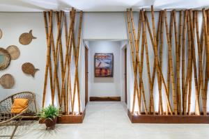 Uma área de estar em Casatua Pousada