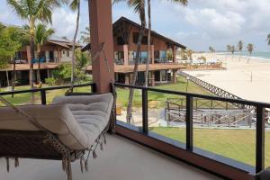 Balkón nebo terasa v ubytování 1st Beachfront Deluxe Apartment B102 in Dream Beach Cumbuco