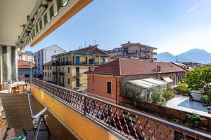 a balcony with a view of a city at Rosalba in Verbania