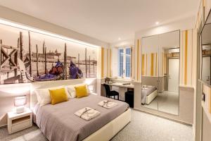 Кровать или кровати в номере Grand Tour Rome Suites - Liberty Collection