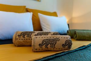 En eller flere senge i et værelse på Apartman Viridis