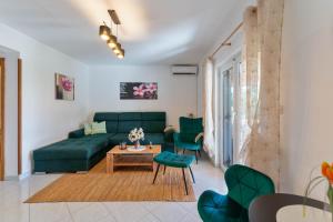 Et opholdsområde på Apartman Viridis