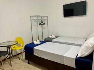 Postel nebo postele na pokoji v ubytování Hotel INDI