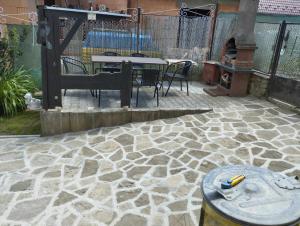 Patio alebo iná vonkajšia časť ubytovania Dom pod Tatrami.