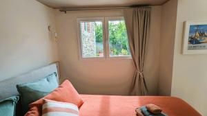 Postel nebo postele na pokoji v ubytování LA GUESTHOUSE - À deux pas du Sentier des Douaniers