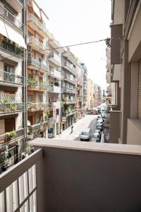 a view of a city street from a balcony at Green rooms in Bari