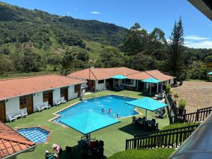 Kolam renang di atau dekat dengan Hotel Hacienda Guane Campestre +31 gambar
