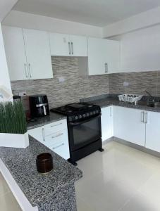 Dapur atau dapur kecil di Apartamento con comfort