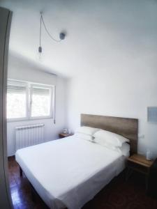 Postel nebo postele na pokoji v ubytování Wunderkammer b&b