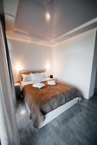 Postel nebo postele na pokoji v ubytování HOTEL Autograph 1 & RESTAURANT & LOUNGE BAR