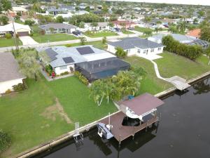 an aerial view of a house on the water at Fun In The Sun: Canal Access in Cape Coral