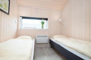 Postel nebo postele na pokoji v ubytování Resort 2 Beach House B 55