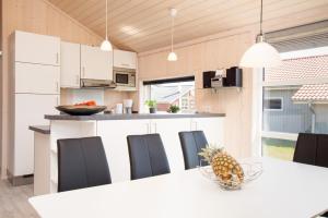 Kuchyň nebo kuchyňský kout v ubytování Resort 2 Beach House B 55