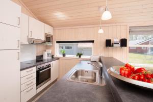 Kuchyň nebo kuchyňský kout v ubytování Resort 2 Beach House B 55