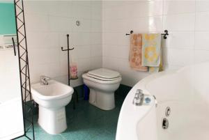 A bathroom at Camera privata con cucina