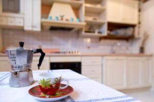 A kitchen or kitchenette at Camera privata con cucina