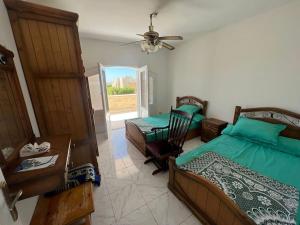 Кровать или кровати в номере A whole private villa in El sahel - North coast