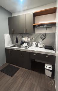 Kuchyň nebo kuchyňský kout v ubytování CJ Apartments