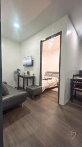 Postel nebo postele na pokoji v ubytování CJ Apartments
