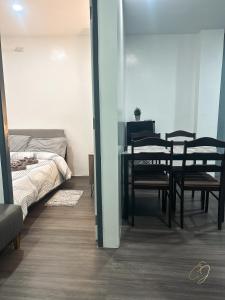 Postel nebo postele na pokoji v ubytování CJ Apartments