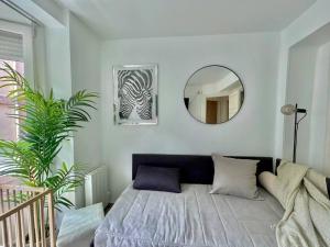 Ένα ή περισσότερα κρεβάτια σε δωμάτιο στο Arostegi apartment - En pleno casco antiguo