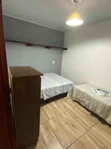 Ένα ή περισσότερα κρεβάτια σε δωμάτιο στο Casinha Azul