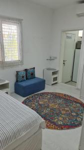 Postel nebo postele na pokoji v ubytování דירַת נופֶש רחל Rachel's House